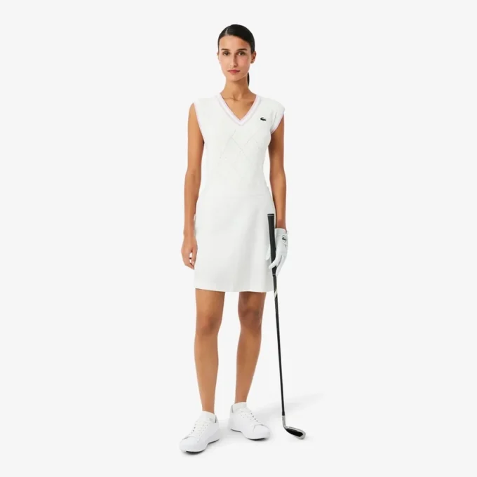 Stretch-Strickweste für Damen beim Golf Stretch-Strickweste für Damen beim Golf