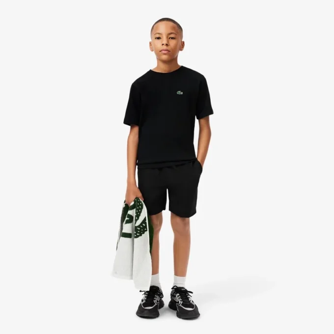 Technisches Ultra Dry-Sport-T-Shirt aus Baumwolle für Kinder Technisches Ultra Dry-Sport-T-Shirt aus Baumwolle für Kinder