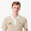 Thermoregulierendes gestreiftes Golf-Poloshirt für Herren Thermoregulierendes gestreiftes Golf-Poloshirt für Herren