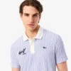 Thermoregulierendes gestreiftes Golf-Poloshirt für Herren Thermoregulierendes gestreiftes Golf-Poloshirt für Herren