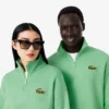 Unisex-Sweatshirt mit halbem Reißverschluss, lockerer Passform und Emblem-Akzent Unisex-Sweatshirt mit halbem Reißverschluss, lockerer Passform und Emblem-Akzent