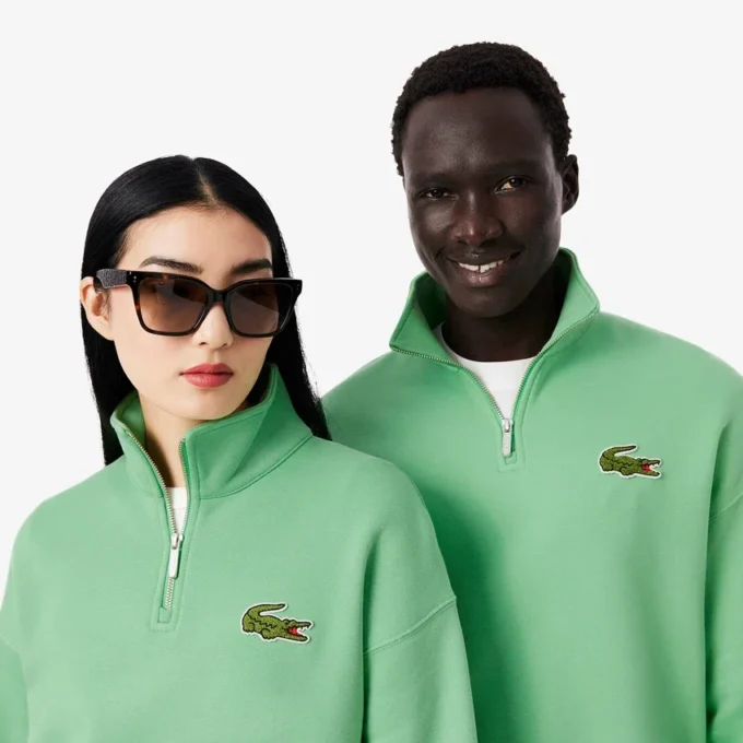 Unisex-Sweatshirt mit halbem Reißverschluss, lockerer Passform und Emblem-Akzent Unisex-Sweatshirt mit halbem Reißverschluss, lockerer Passform und Emblem-Akzent