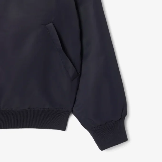 Wasserabweisende Bomberjacke für Herren mit gesticktem Emblem Wasserabweisende Bomberjacke für Herren mit gesticktem Emblem