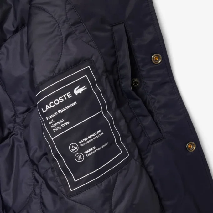 Wasserabweisende Bomberjacke für Herren mit gesticktem Emblem Wasserabweisende Bomberjacke für Herren mit gesticktem Emblem