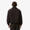 Wasserabweisende Herren-Aviator-Jacke mit Emblem Wasserabweisende Herren-Aviator-Jacke mit Emblem