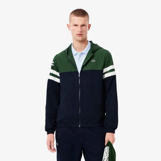 Wasserabweisende Herren-Tennisjacke mit Kapuze Wasserabweisende Herren-Tennisjacke mit Kapuze
