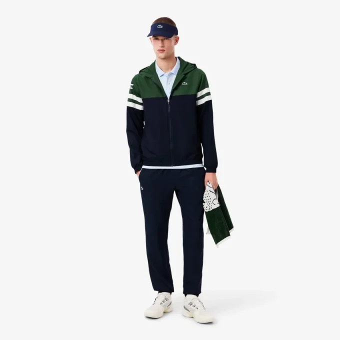 Wasserabweisende Herren-Tennisjacke mit Kapuze Wasserabweisende Herren-Tennisjacke mit Kapuze