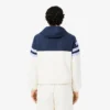 Wasserabweisende Herren-Tennisjacke mit Kapuze Wasserabweisende Herren-Tennisjacke mit Kapuze