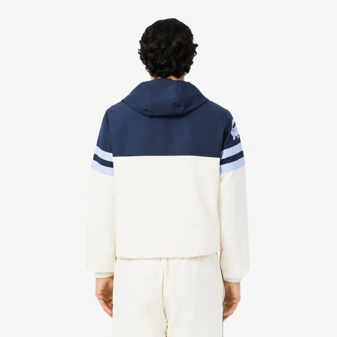 Wasserabweisende Herren-Tennisjacke mit Kapuze Wasserabweisende Herren-Tennisjacke mit Kapuze