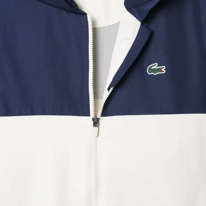 Wasserabweisende Herren-Tennisjacke mit Kapuze Wasserabweisende Herren-Tennisjacke mit Kapuze