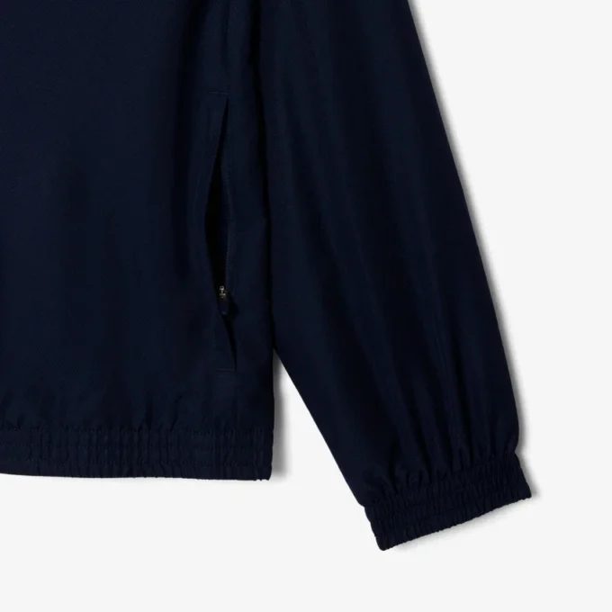 Wasserabweisende Herren-Tennisjacke mit Kapuze Wasserabweisende Herren-Tennisjacke mit Kapuze