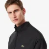 Wasserabweisende Herren-Trainingsjacke mit Kapuze Wasserabweisende Herren-Trainingsjacke mit Kapuze