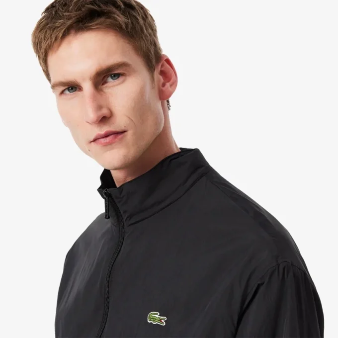 Wasserabweisende Herren-Trainingsjacke mit Kapuze Wasserabweisende Herren-Trainingsjacke mit Kapuze