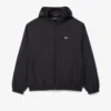 Wasserabweisende Herren-Trainingsjacke mit Kapuze Wasserabweisende Herren-Trainingsjacke mit Kapuze