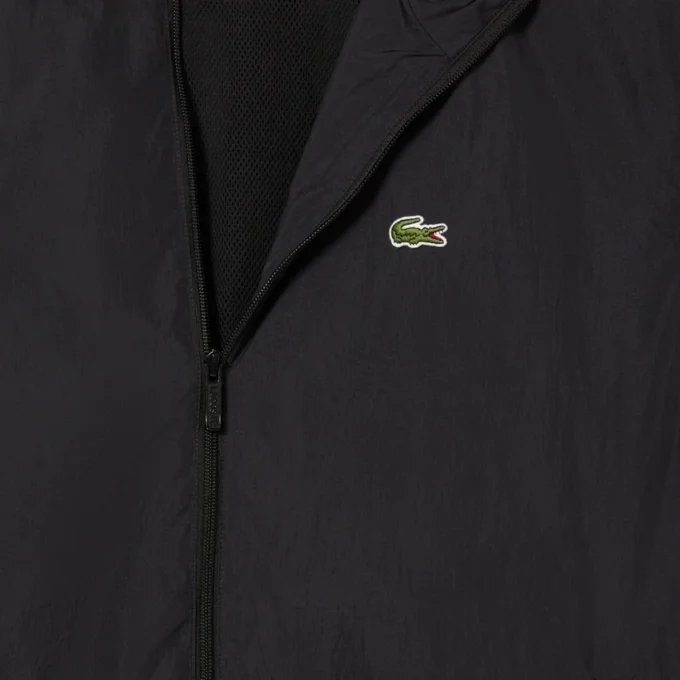 Wasserabweisende Herren-Trainingsjacke mit Kapuze Wasserabweisende Herren-Trainingsjacke mit Kapuze