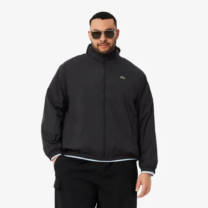 Wasserabweisende Herren-Trainingsjacke mit Kapuze Wasserabweisende Herren-Trainingsjacke mit Kapuze
