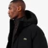 Wasserabweisende lange Daunenjacke für Herren Wasserabweisende lange Daunenjacke für Herren