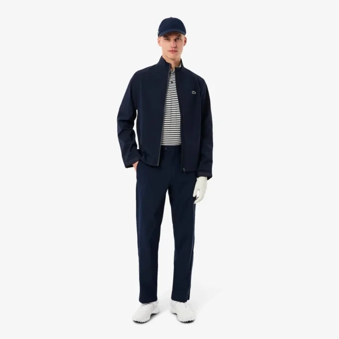 Wasserabweisende Stretch-Windjacke für Herren beim Golf Wasserabweisende Stretch-Windjacke für Herren beim Golf
