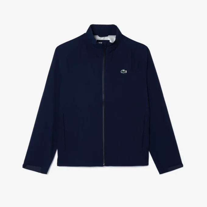 Wasserabweisende Stretch-Windjacke für Herren beim Golf Wasserabweisende Stretch-Windjacke für Herren beim Golf