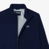 Wasserabweisende Stretch-Windjacke für Herren beim Golf Wasserabweisende Stretch-Windjacke für Herren beim Golf