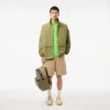Wasserabweisende Windjacke für Herren mit abnehmbarer Kapuze Wasserabweisende Windjacke für Herren mit abnehmbarer Kapuze