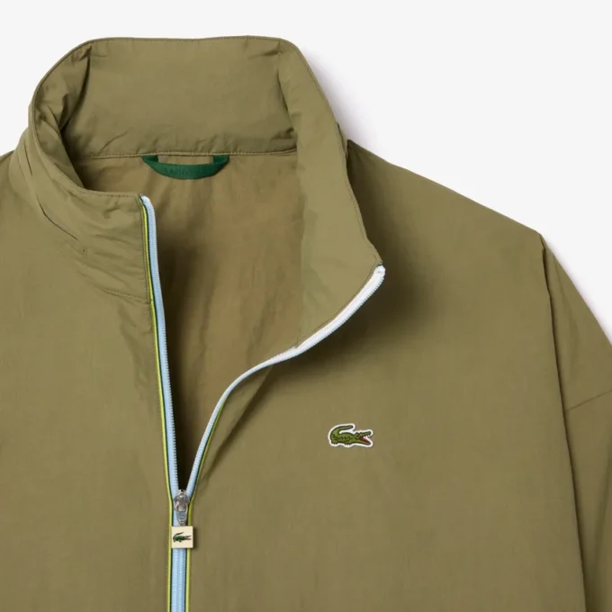 Wasserabweisende Windjacke für Herren mit abnehmbarer Kapuze Wasserabweisende Windjacke für Herren mit abnehmbarer Kapuze