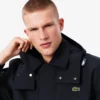 Wasserabweisender Parka mit Kapuze in mittlerer Länge für Herren Wasserabweisender Parka mit Kapuze in mittlerer Länge für Herren