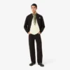 Weit geschnittenes Fleece-Poloshirt mit Emblem Weit geschnittenes Fleece-Poloshirt mit Emblem
