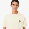 Weit geschnittenes Fleece-Poloshirt mit Emblem Weit geschnittenes Fleece-Poloshirt mit Emblem
