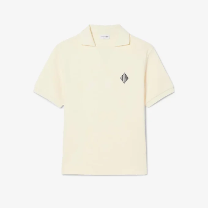 Weit geschnittenes Fleece-Poloshirt mit Emblem Weit geschnittenes Fleece-Poloshirt mit Emblem