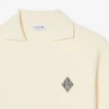 Weit geschnittenes Fleece-Poloshirt mit Emblem Weit geschnittenes Fleece-Poloshirt mit Emblem