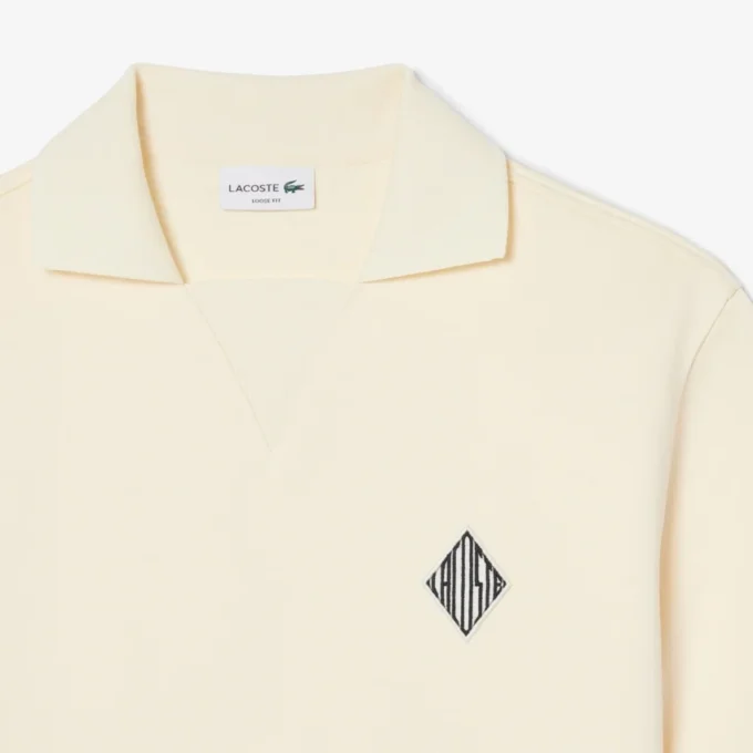 Weit geschnittenes Fleece-Poloshirt mit Emblem Weit geschnittenes Fleece-Poloshirt mit Emblem