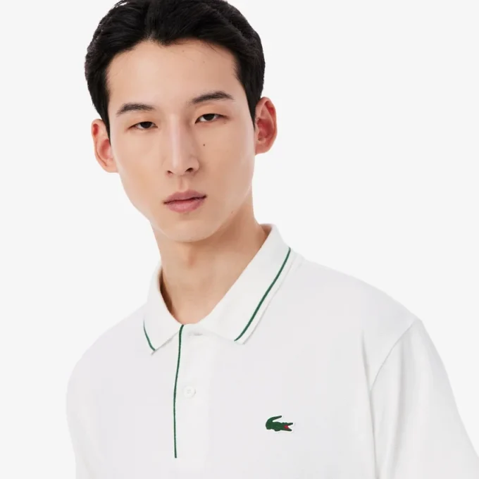 Wärmeregulierendes Mini-Piqué-Golf-Poloshirt Wärmeregulierendes Mini-Piqué-Golf-Poloshirt