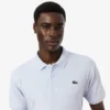 Wärmeregulierendes Mini-Piqué-Golf-Poloshirt Wärmeregulierendes Mini-Piqué-Golf-Poloshirt